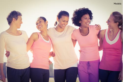 Laughing women wearing pink in a park-img-blog