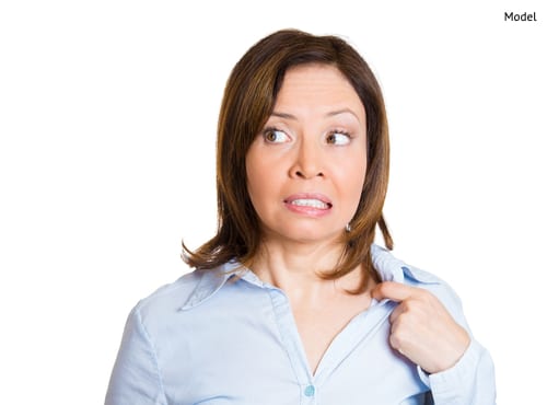 mature business woman opening shirt to vent, its hot, unpleasant, awkward situation-img-blog