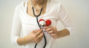 woman holding a stethoscope