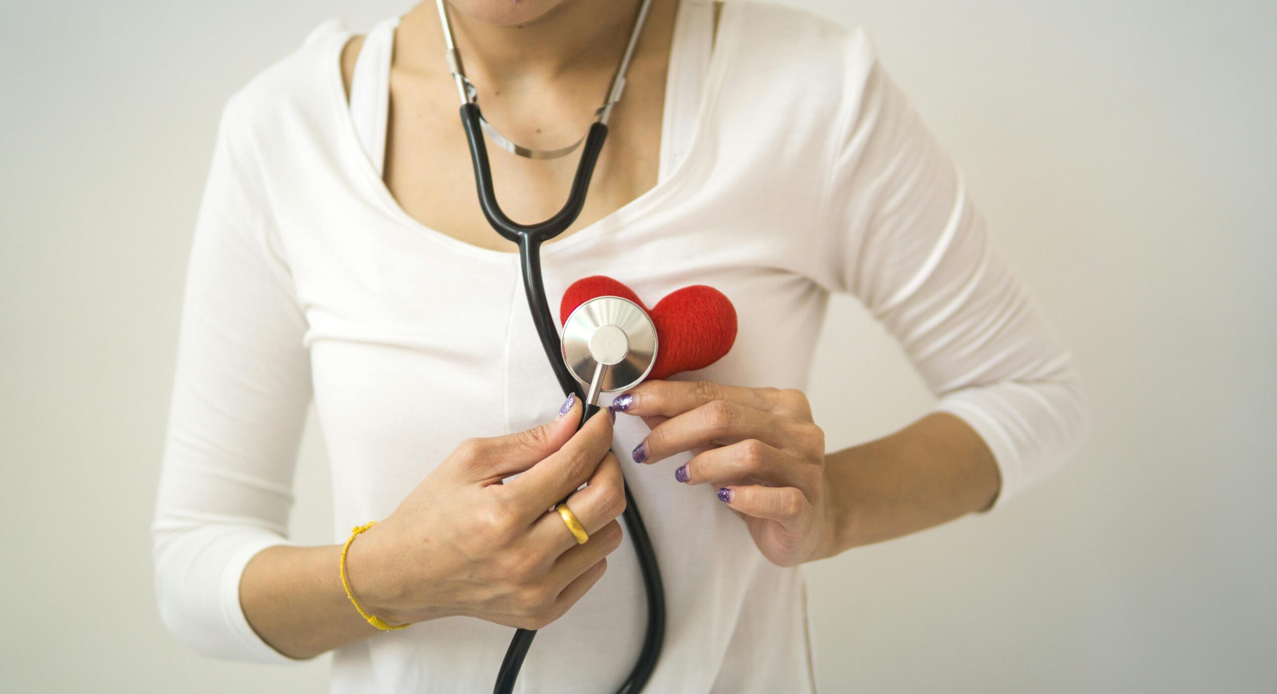 woman holding a stethoscope